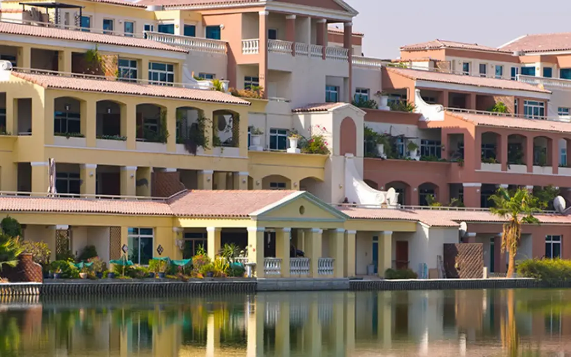 Completed Green Community lakefront buildings in Dubai Investments Park